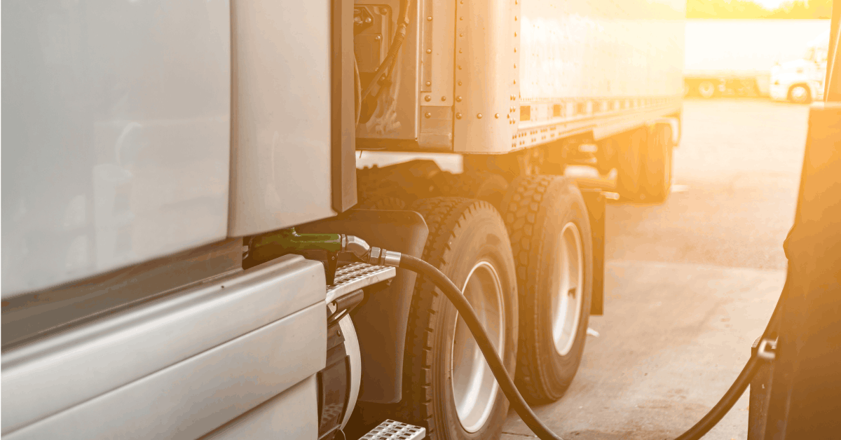 Diesel pump nozzle at a Houston truck stop — how fuel surcharges are calculated on freight invoices